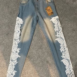Denim jeans with lacy sides